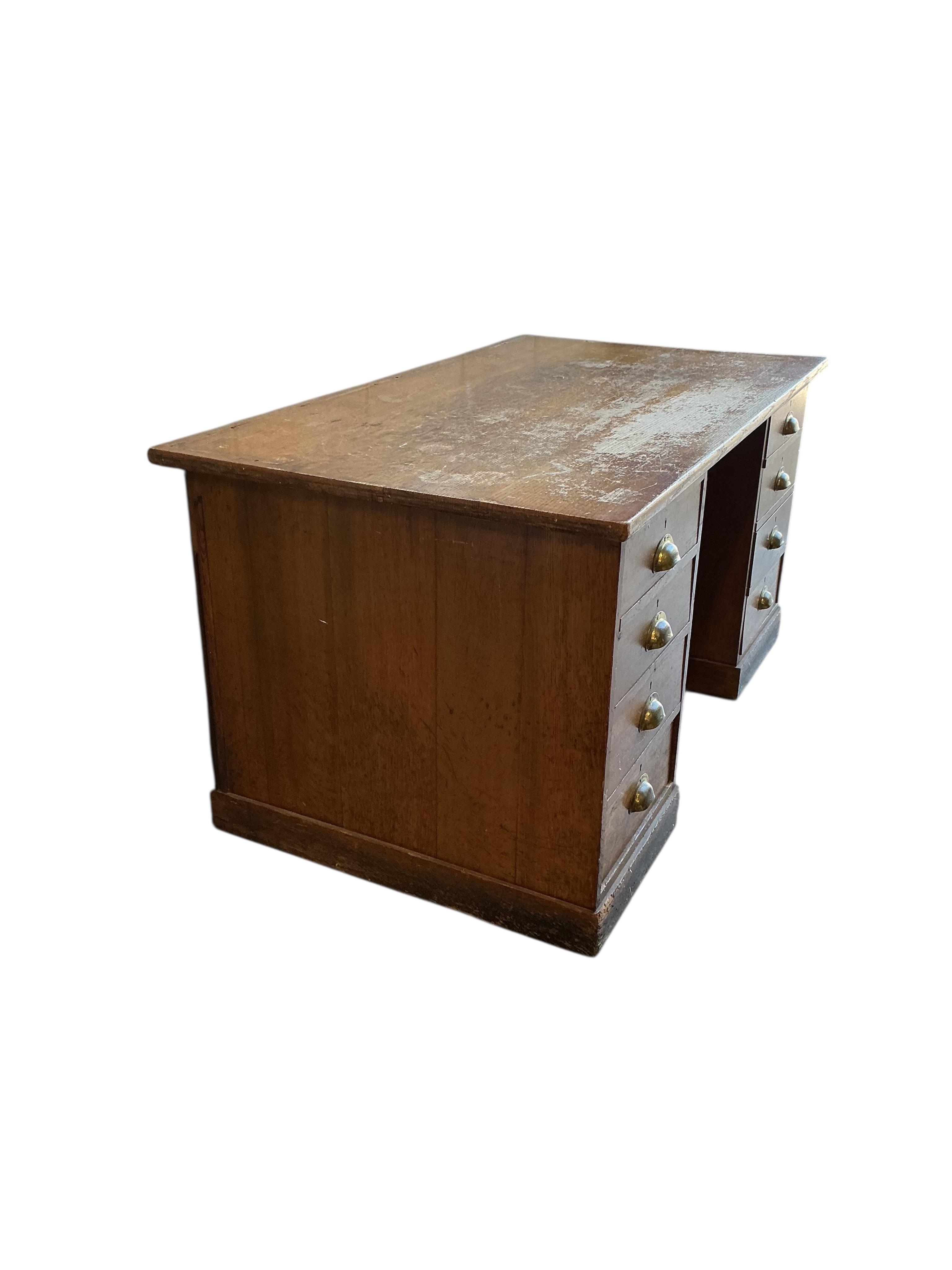 An early 20th century oak pedestal desk, adapted, width 152cm, depth 83cm, height 77cm